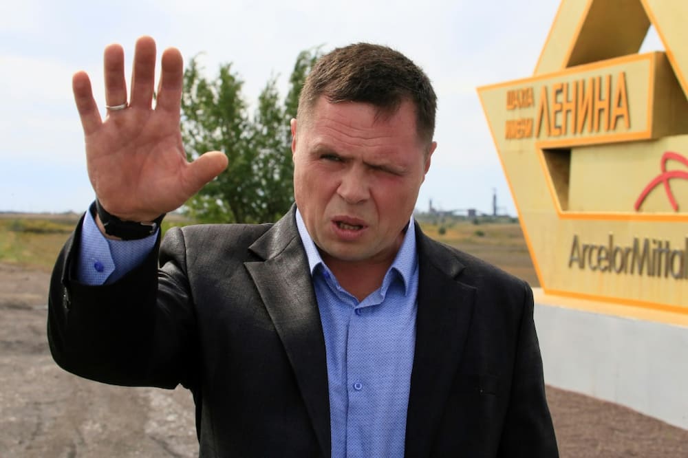 Former coal miner Vladimir Khaniev outside ArcelorMittal's Lenin mine