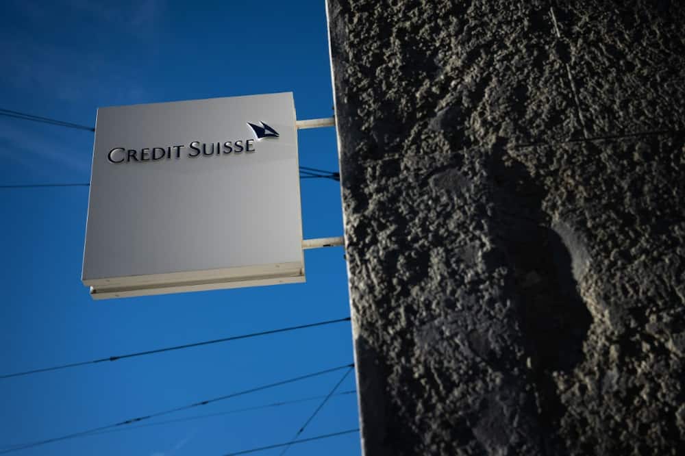 A sign ooutside a Credit Suisse bank branch in Geneva