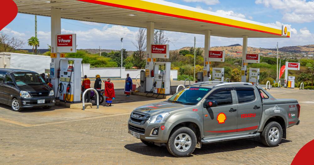 Cars fuel at Shell Petrol Station.