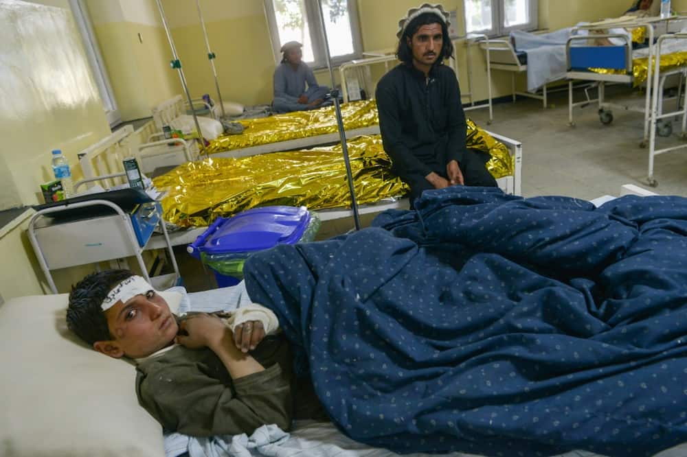 An Afghan youth is treated inside a hospital in the city of Sharan after he was injured in the earthquake on June 22, 2022