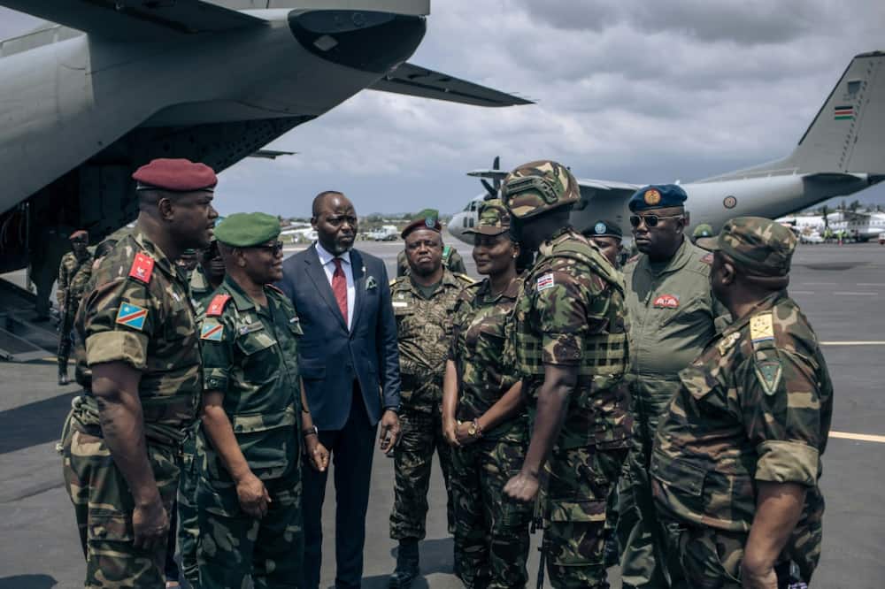 The Kenyan troops were greeted by local dignitaries