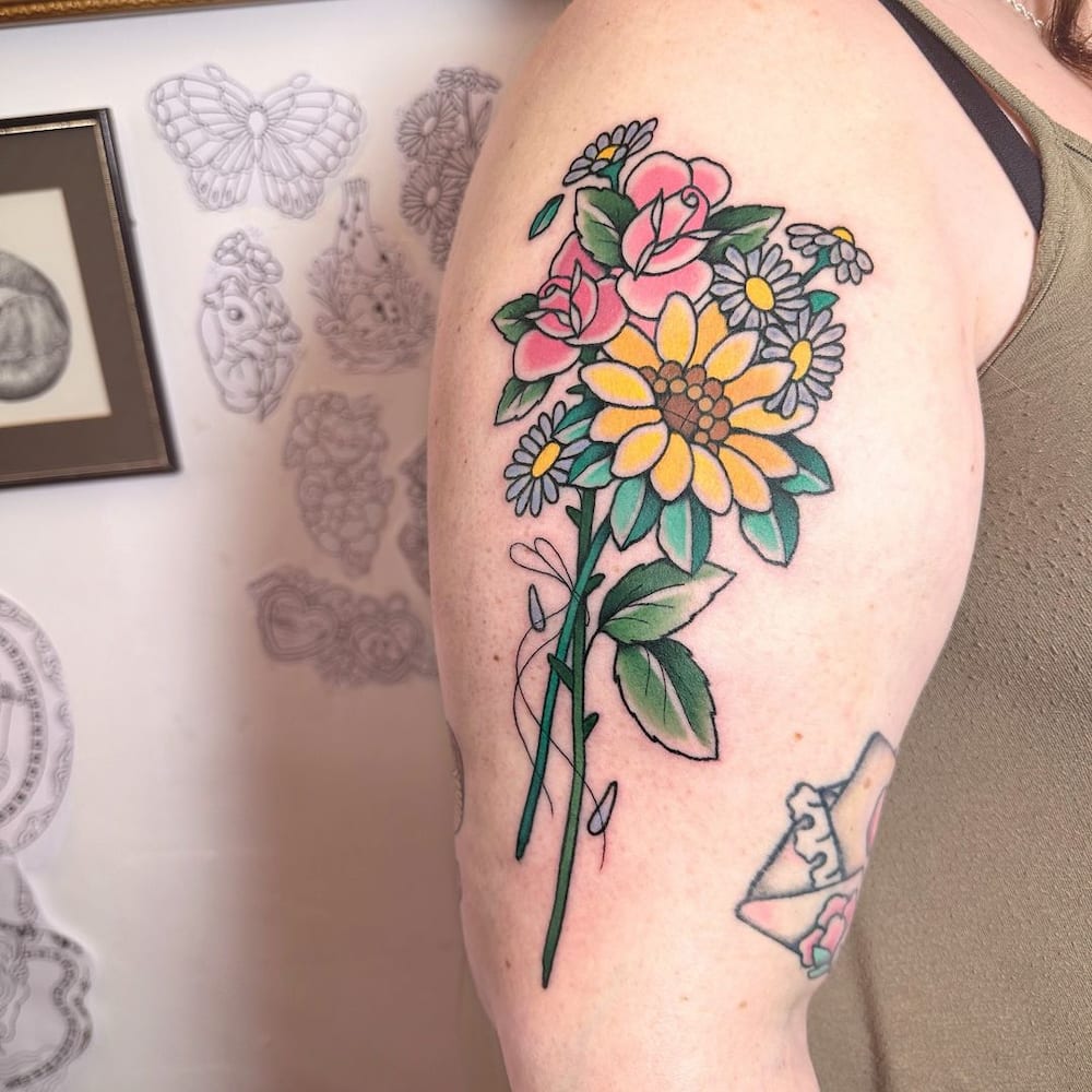 Multi-coloured daisy tattoo design