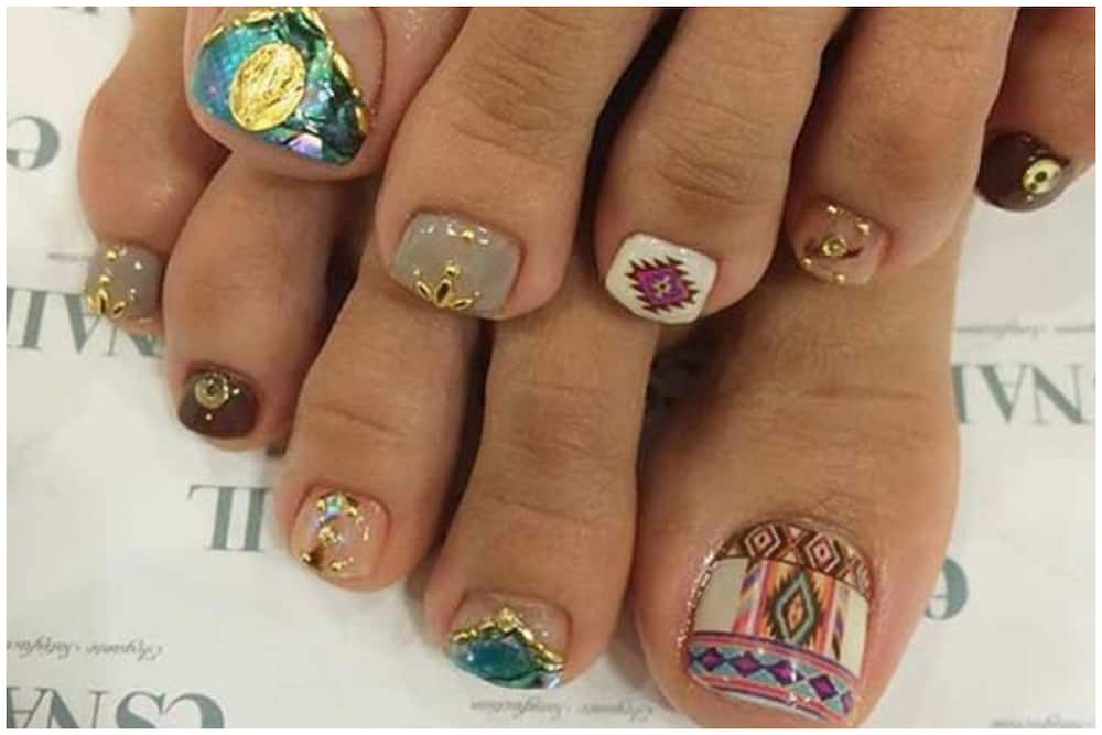 Tribal toe nail design.