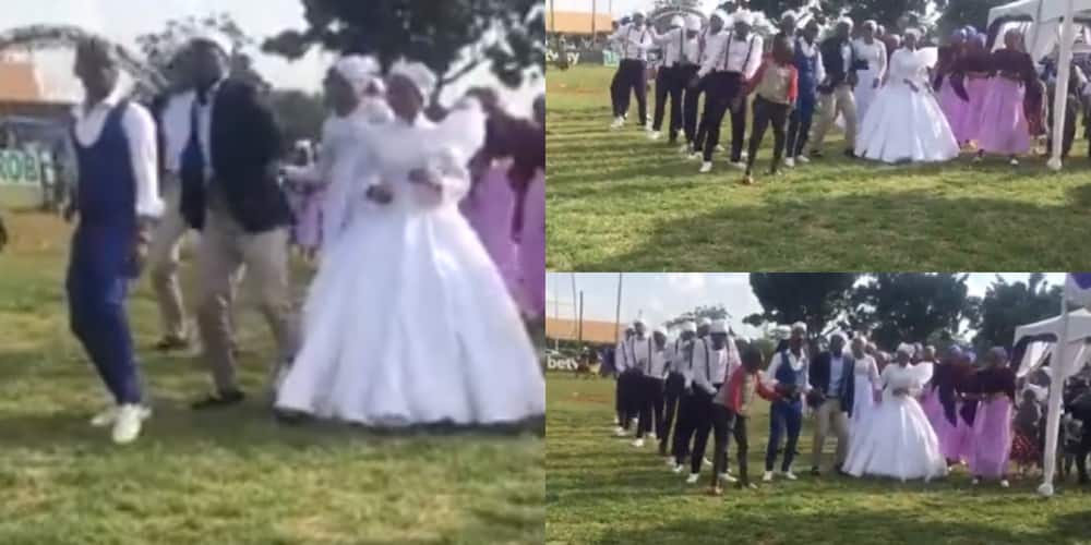 Akorino bridal party allow young boy to dance at wedding.