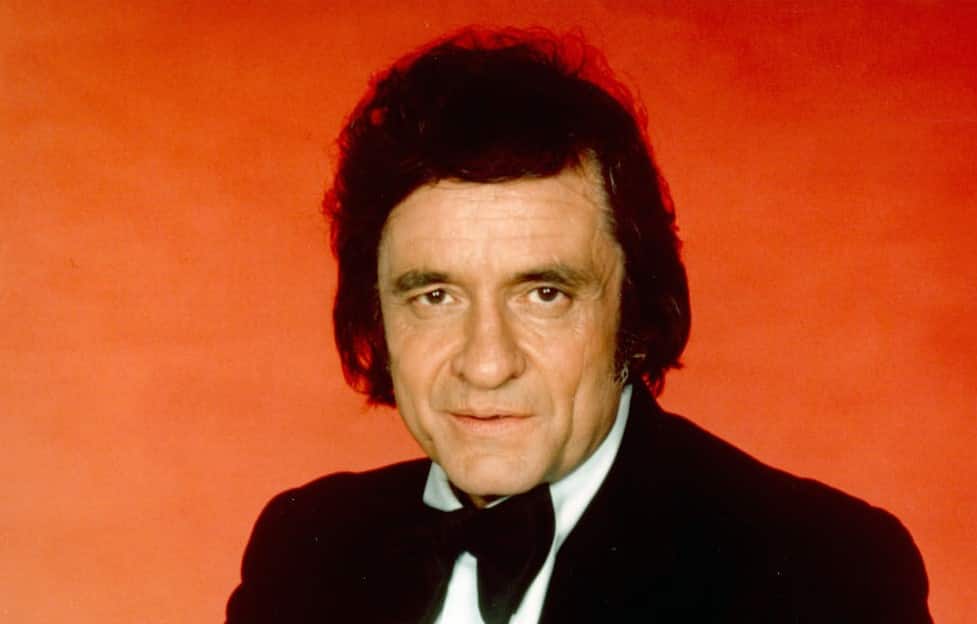 Johnny Cash poses for a portrait in circa 1976