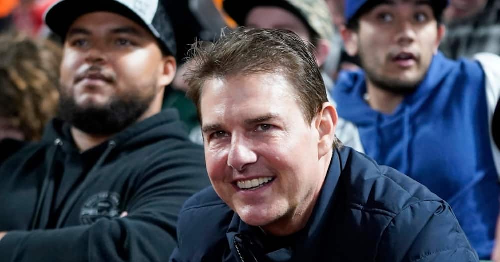 Tom Cruise spotted looking diffrent at baseball game.