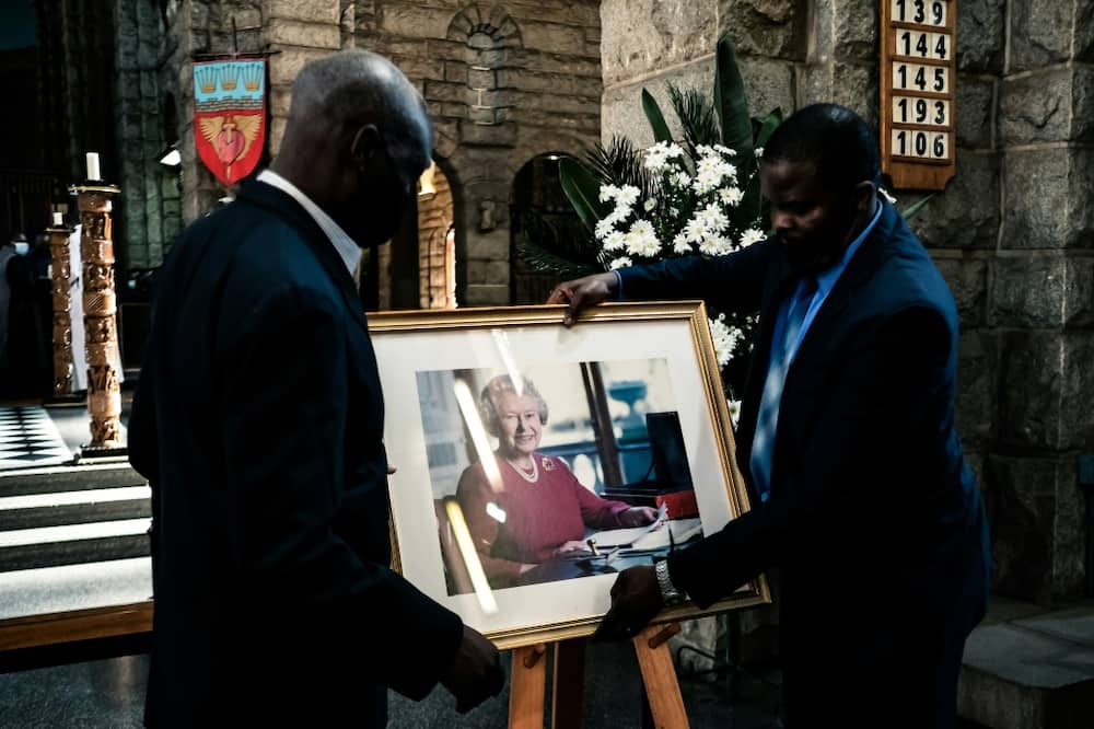 A portrait of the queen is placed on a stand ahead of a thanksgiving service at the Anglican Cathedral