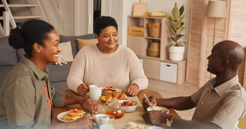 A family enjoying breakfast.