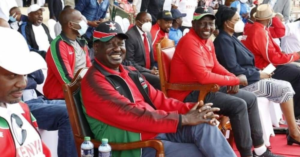 Raila Odinga dons William Ruto's signature cap as duo share podium