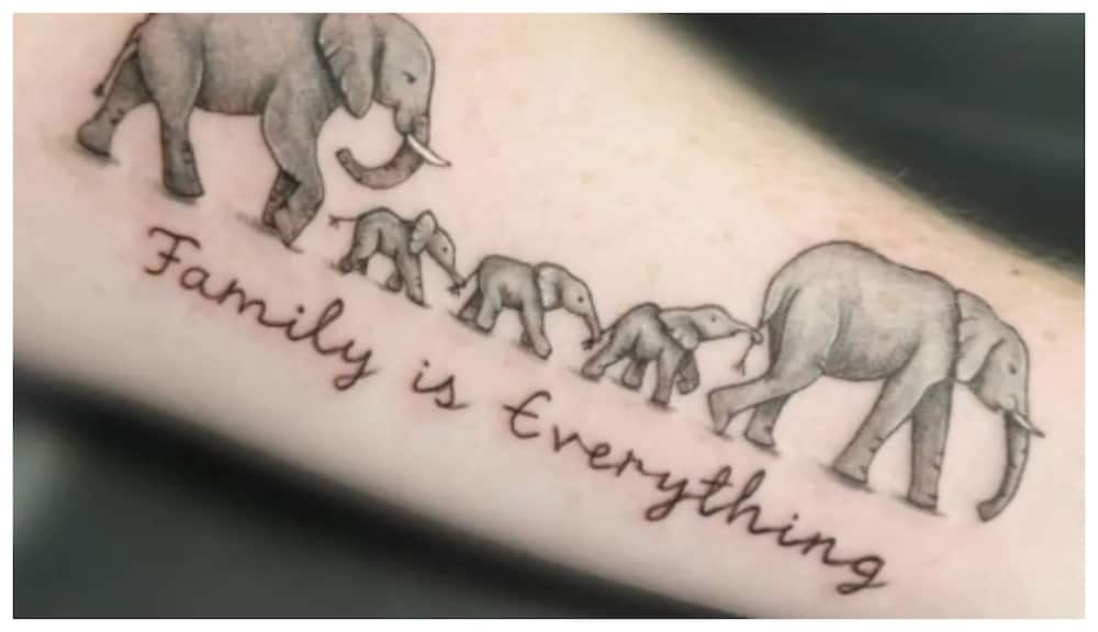 motherhood elephant family tattoo