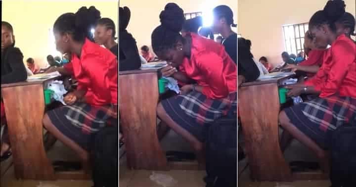 Female student consumes garri and soup in class.