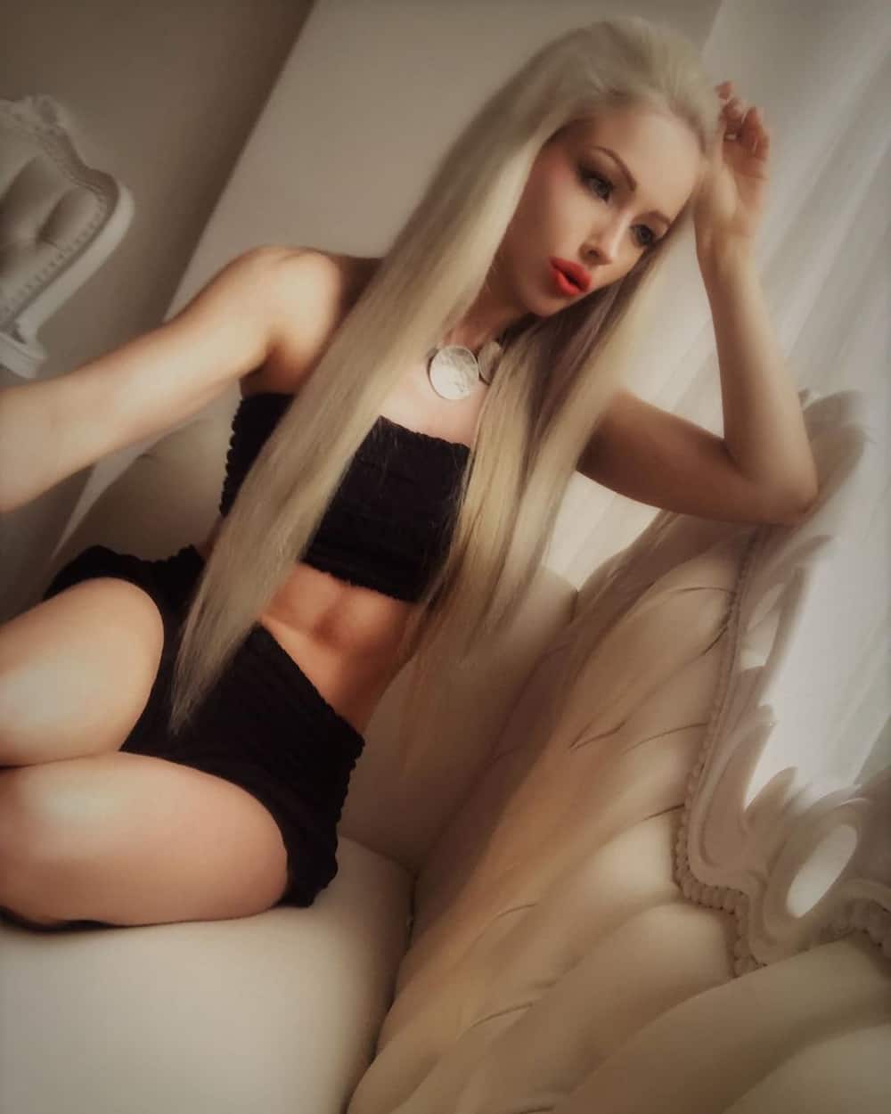 human Barbie doll before surgery