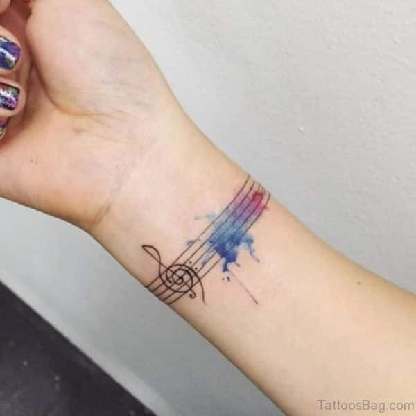 women's music tattoo