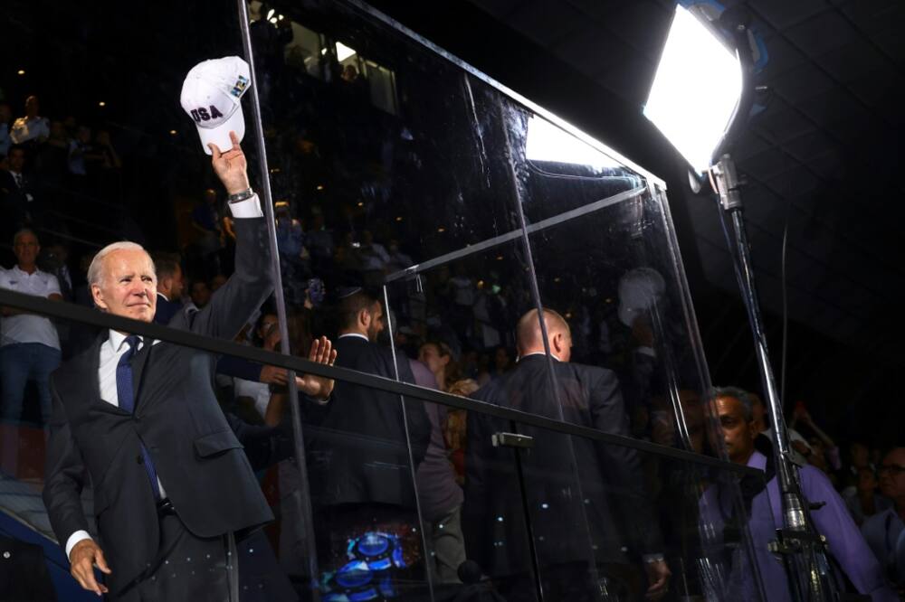 US President Joe Biden greets fans as he attends the opening ceremony of the Maccabiah Games at Teddy Stadium in Jerusalem on July 14