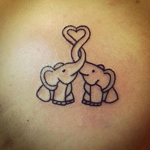 motherhood elephant family tattoo