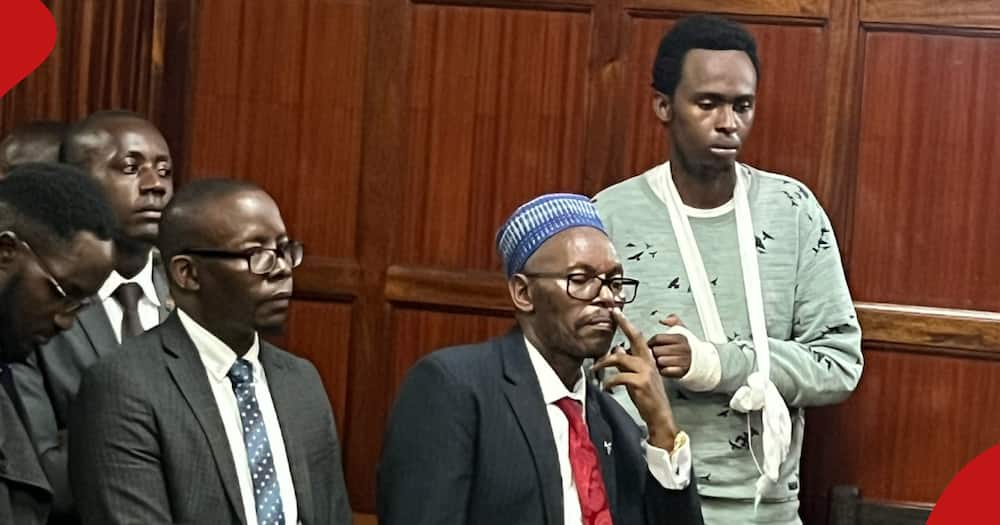 Ian Njoroge with his lawyers.