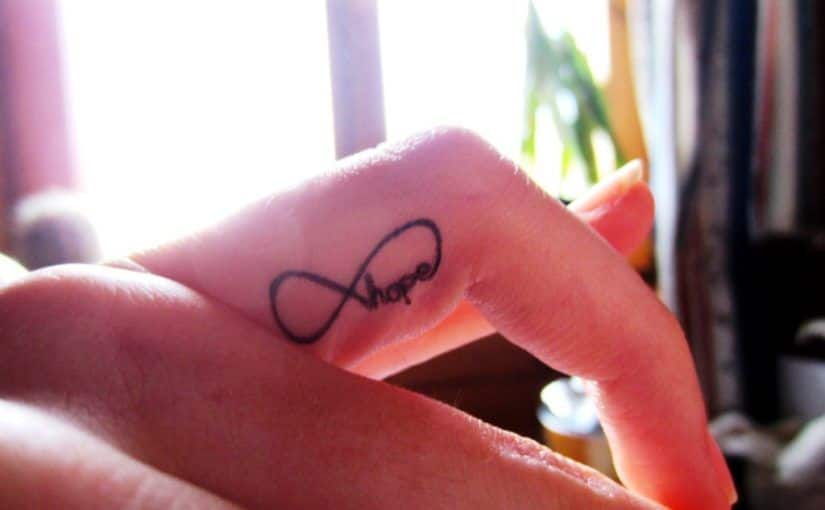 infinity tattoos on finger