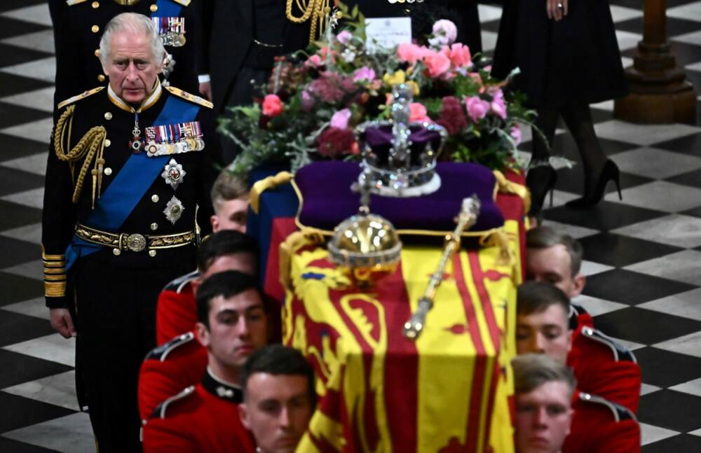 The king's message on the floral tribute to his mother read: 'In loving and devoted memory. Charles R.'