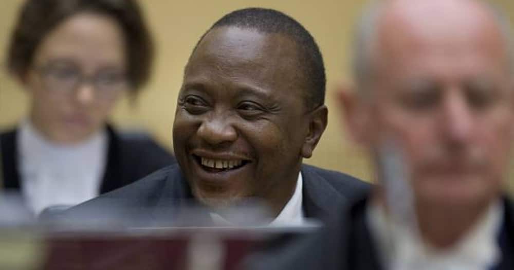 Uhuru Kenyatta at the ICC. Evans Monari was one of the lawyers who represented him.