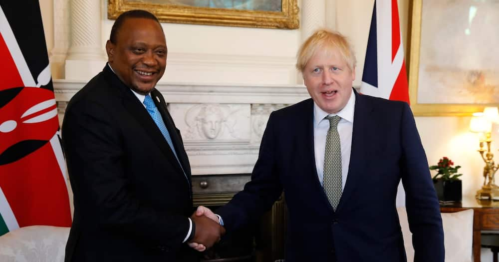 UK Prime Minister Boris Johnson (r) and President Uhuru Kenyatta. Photo: Getty Images.