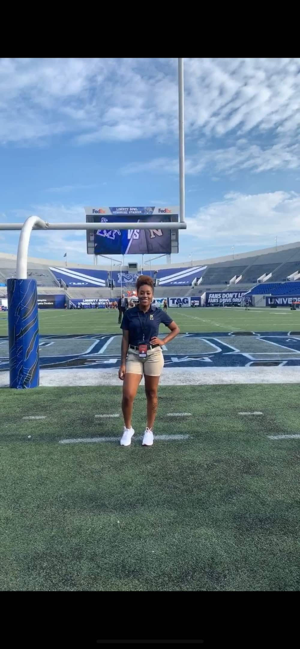 Young black lady celebrates as she graduates from US Naval Academy