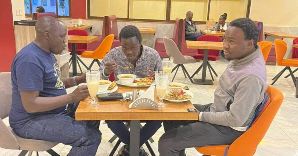 Police officer Albert Kipchumba (l) with his sons. Photo: Albert Kipchumba.