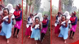 Video of Woman Carrying Bride on Back to Avoid Mud Warms Heart: "Bless Her Heart"