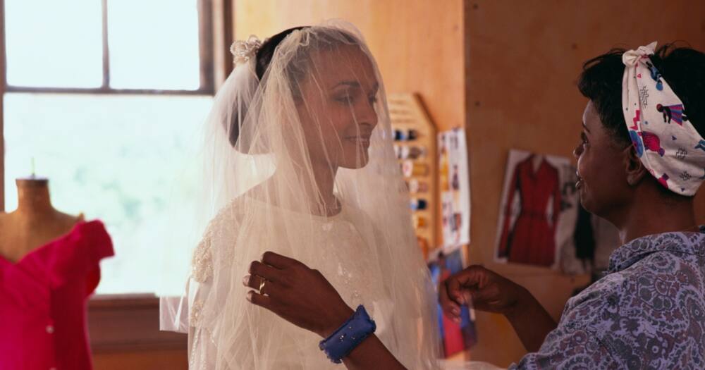 Bride getting fitted. Photo: Getty Images.